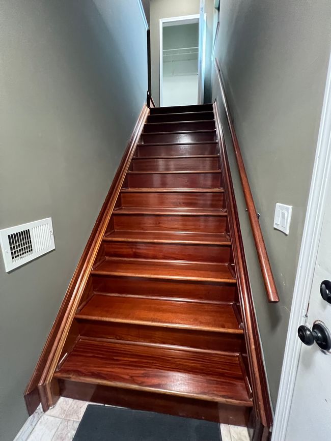 THE FOYER STAIRS LEAD TO LG LIVING RM (13'X17') | Image 8