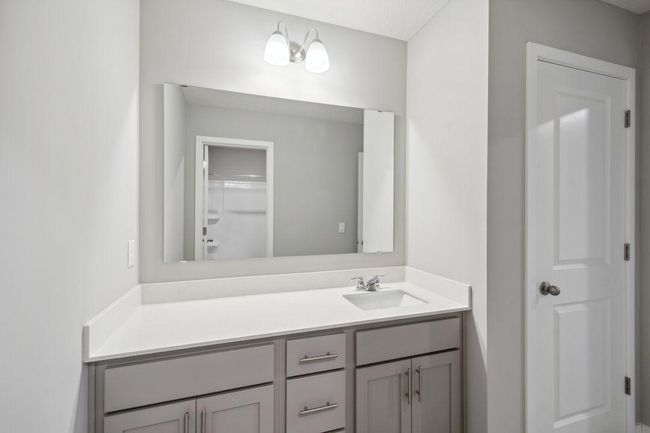 Upper level bath with dual sinks (not shown). Model photos. Options and colors will vary. | Image 35