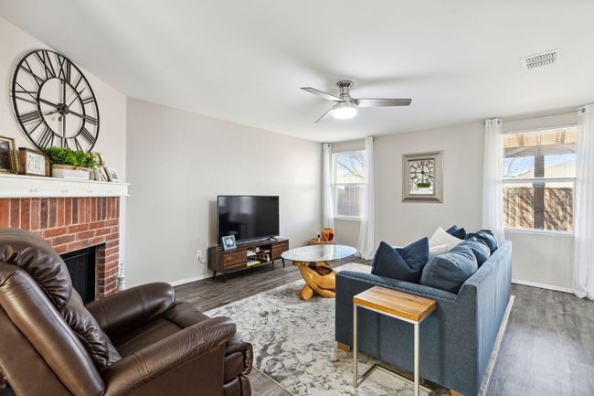 Warm and inviting living room perfect for relaxing or entertaining | Image 11
