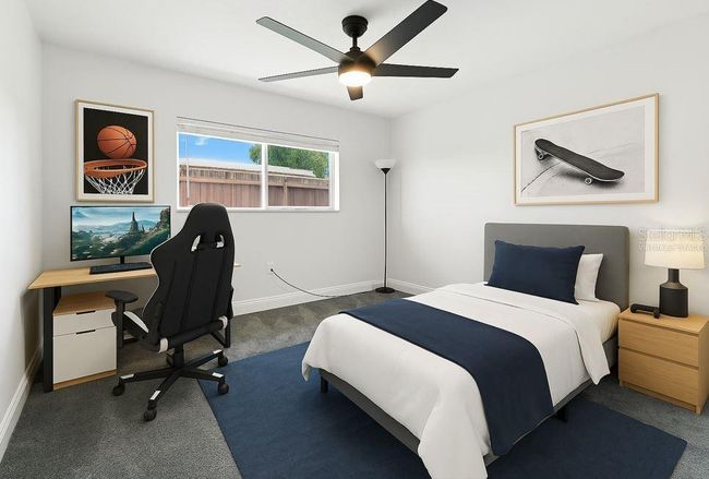Virtually Staged - Bedroom 3 keeps it cool and versatile—whether it's a cozy guest suite, a dedicated workspace, or a kiddo's command center. The large window brings in great natural light, and the layout offers plenty of room to spread out and make it yours | Image 37