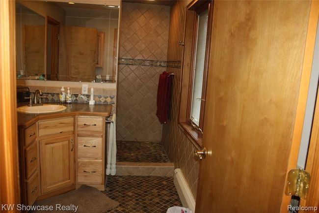 Master bathroom, looking into walk in shower with heat lamp. | Image 26