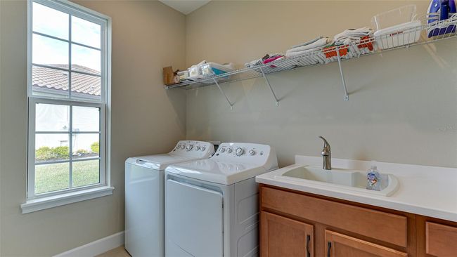 Laundry room with utility sink | Image 23
