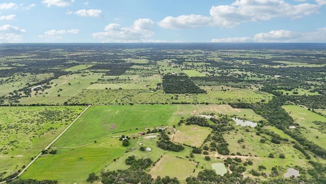 Aerial view of sparsely populated area featuring property boundaries highlighted | Image 14
