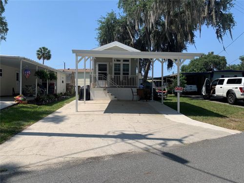 699 Cindi Ave, LEESBURG, FL, 34788-2417 | Card Image