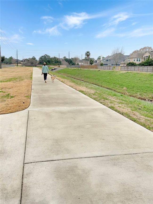 Enjoy walking, running, or biking on the paved trail or dirt trail. Trail leads to miles of scenery: from streets to eats. Make your way to Gringos, Hasta la Pasta, Rao's Bakery Coffee Cafe, Nail Salon, CBD Health & Wellness, Bike Barn, Aqua-Tots Collins Park, or Meyer Park. Benches and doggie bag stations are conveniently located throughout the trails. | Image 48