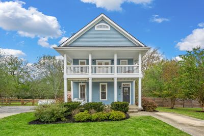 Welcome Home! Double front porches make this special home even more charming! | Image 1