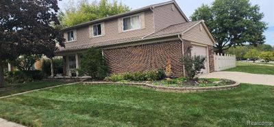 210 N Princess Drive W, Home with 4 bedrooms, 2 bathrooms and null parking in Canton Twp MI | Image 2