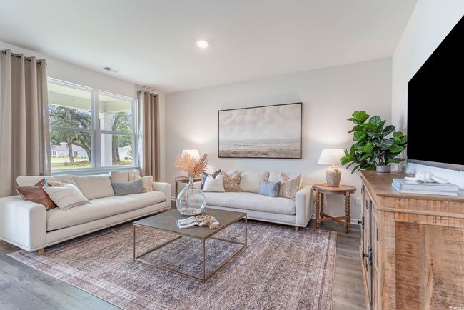 Living room with hardwood / wood-style flooring | Image 10