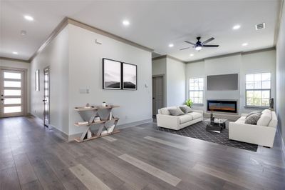 View of front of property with a garage and a front lawn | Image 3