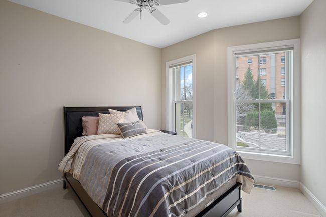 2nd level - 2nd bedroom overlooking fountain courtyard with walk-in closet | Image 34