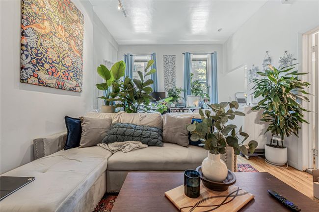 Living area featuring wood finished floors | Image 13