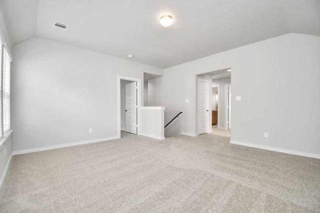 Take another look at this beautiful and spacious loft area, perfect for a game room! | Image 29