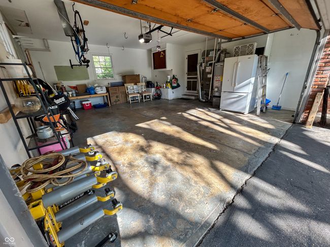 2 car garage with additional flex space, automated door opener | Image 30