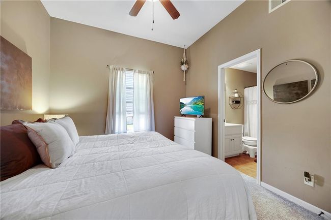Upper level bedroom with a full bathroom. | Image 36