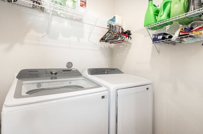 Laundry room off the kitchen. Washer/Dryer convey with the sale. | Image 20