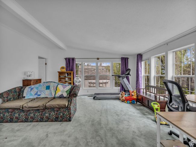 Family room with plenty of natural light and vaulted ceiling | Image 8
