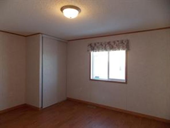 77 - 5210 65 Ave, Home with 3 bedrooms, 2 bathrooms and 3 parking in Olds AB | Image 33