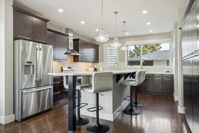 1721 44 Avenue Sw, Home with 4 bedrooms, 3 bathrooms and 2 parking in Calgary AB | Image 9