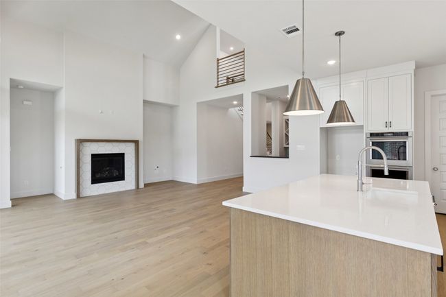 The open concept design of our Brenham III floor plan is an entertainter's dream home! | Image 8