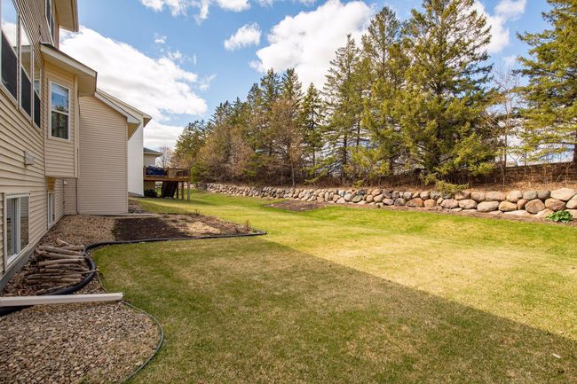 Nice flat back yard | Image 26