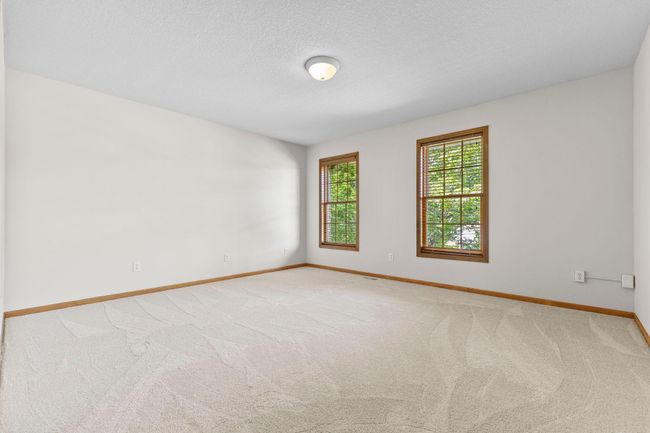 2nd large upper bedroom has new carpeting and a walk in closet | Image 35