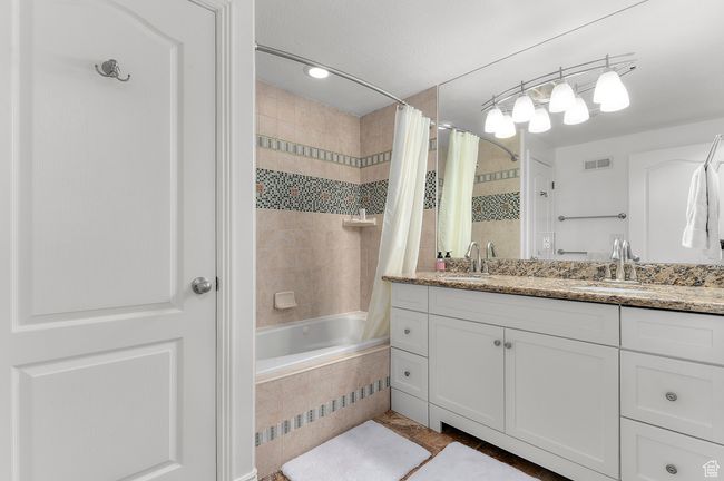 Basement Bathroom with oversized vanity and linen closet. | Image 19