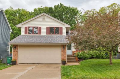 6920 Mill Pond Drive, Home with 3 bedrooms, 2 bathrooms and null parking in Urbandale IA | Image 1