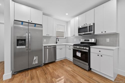 2561 99th St, East Elmhurst, NY, 11369-1613 | Card Image