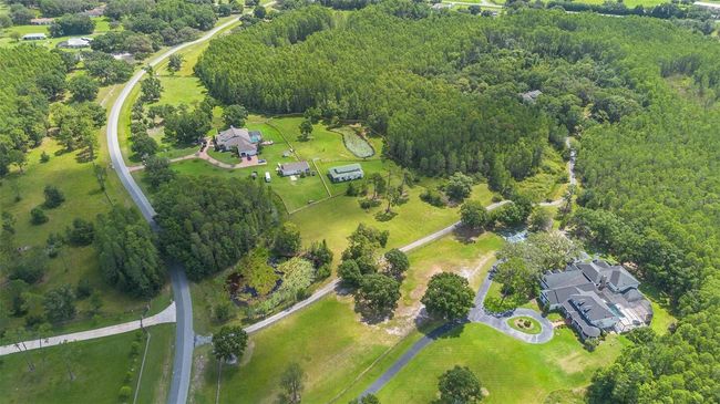 11933 Pasco Trails Blvd, House other with 4 bedrooms, 3 bathrooms and null parking in SPRING HILL FL | Image 64