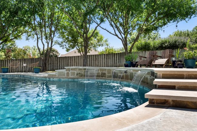 View of pool featuring a fenced backyard | Image 27