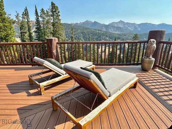 Summer setting for outside wrap around deck, with Spanish Peaks views. | Image 85