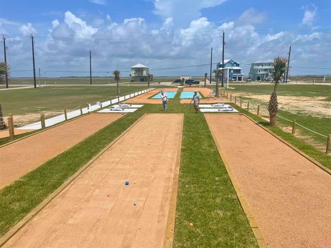 From morning games with neighbors to sunset competitions with guests, this community rec space is all yours. Just a stroll from your home, these vibrant amenities encourage connection, relaxation, and play in the open ocean breeze. | Image 23