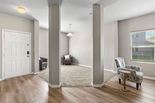 This area has a lot of different potential. Kids play area? Dining? Office? Close it in for another bedroom? Reading area? | Image 11