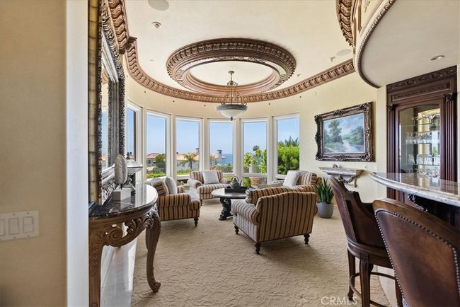 Wet Bar and Sitting Area with lovely windows to take in those ocean views! | Image 16