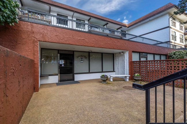 Exterior space featuring stucco siding and a balcony | Image 34