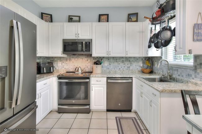 34852 Teeview Ln, Townhouse with 3 bedrooms, 3 bathrooms and null parking in ZEPHYRHILLS FL | Image 14