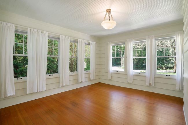 Sunroom with a lot of natural light | Image 4