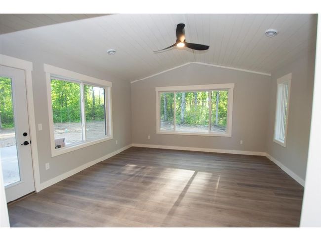 Similar home under construction. Sunroom. | Image 9