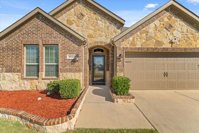 View of front of house featuring a garage | Image 3