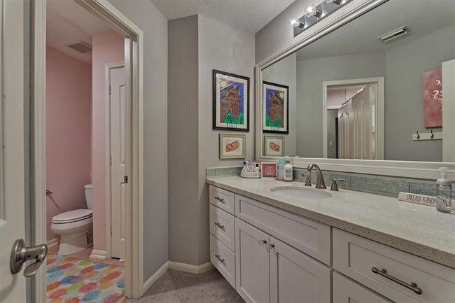 Shared Bath for Bedrooms #3 and #4. Each has designated sink area. | Image 33