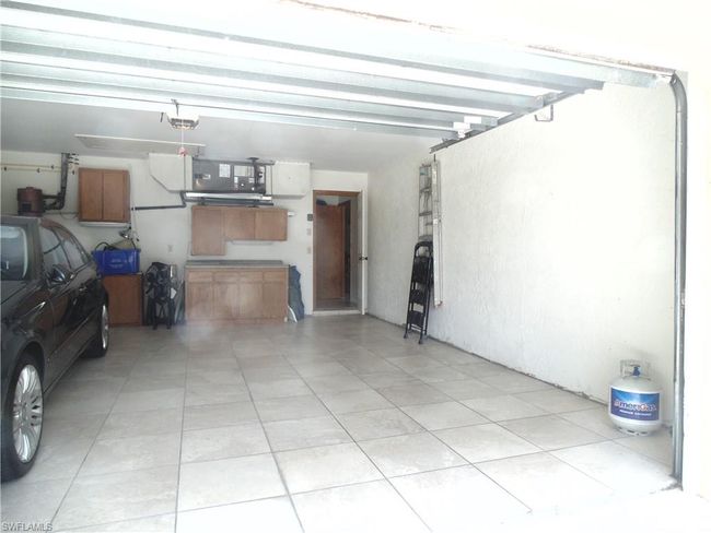 One space Garage parking with a garage door opener | Image 26