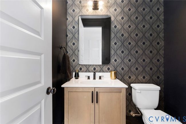 Bathroom featuring vanity and tile walls | Image 27