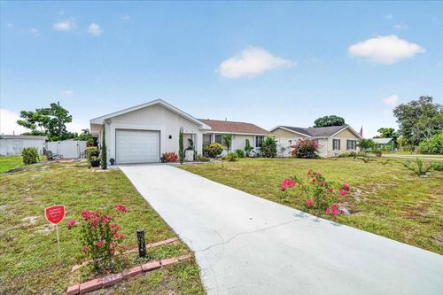 885 Fairfax Ter Nw, PORT CHARLOTTE, FL, 33948-3718 | Card Image