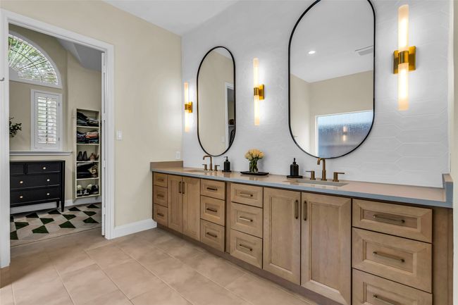 Primary Bathroom Hs New Cabinets, Mirrors & Light Fixtures! | Image 18