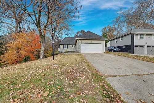 1406 Ne 52nd Ter, Kansas City, MO, 64118-5707 | Card Image