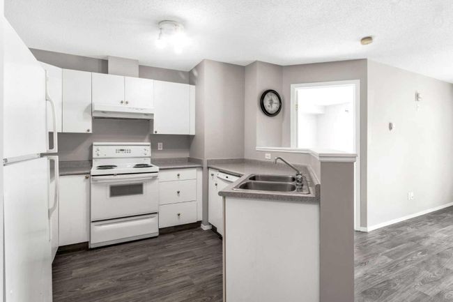1113 - 604 8 Street Sw, Home with 2 bedrooms, 2 bathrooms and 2 parking in Airdrie AB | Image 11