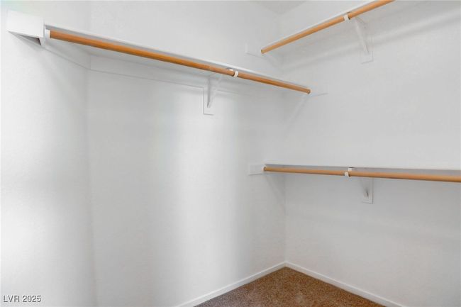 Walk in closet with carpet flooring | Image 24