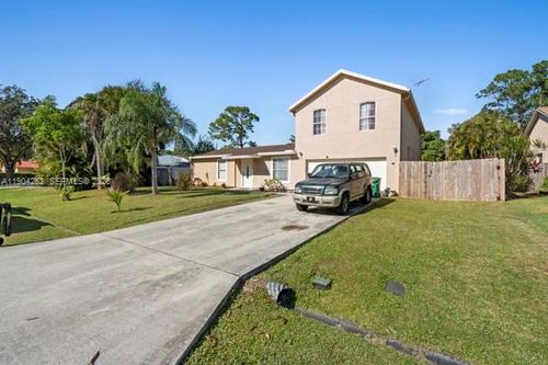 707 Se Karrigan Ter, Port St Lucie, FL, 34983-3215 | Card Image