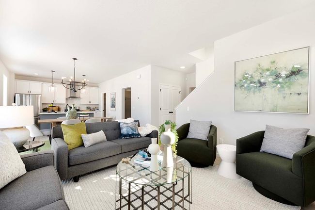 The open-concept design of the home allows each room to naturally flow into the next, creating an expansive and airy feel. Photos are from previously built home; features and options will vary. | Image 5