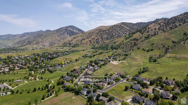 Aerial view of residential area with a mountain backdrop | Image 44